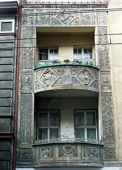 balconies with bas-reliefs