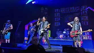 Less Than Jake performing in 2022. From left to right: J.R. Wasilewski, Buddy Schaub, Chris DeMakes, Matt Yonker, Roger Lima.