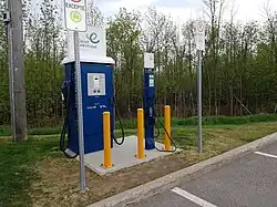 A charging site in Quebec, Canada with a 50&nbsp;kW CHAdeMO / CCS "combo" DC fast charger and a Level 2 AC connector.