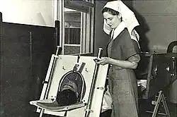 A Both cabinet respirator being used to treat a patient at the 110th Australian Military Hospital in 1943