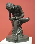 The Spinario (boy removing a thorn from his foot), 1st century BC, modern copy