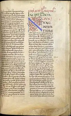 A page from a centuries-old hand-written codex with a large initial letter in the text