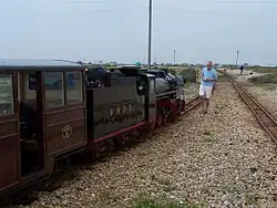 A train in the loop out of Dungeness waits at the points
