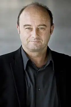 Bust portrait of De Wever