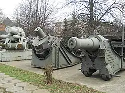 A Romanian M1891 on a garrison mount (right).