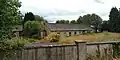 One of the one-story buildings as seen from the nuns' cemetery