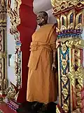 Statue of Luang Por Hong, the founder, at the front of Ubosot