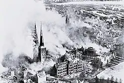 Burning Lübeck Cathedral after an air raid in 1942.