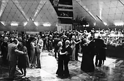In 1976, the Honeckers attend the banquet-ball for the opening of the Palace of the Republic in East Berlin.