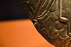 Small hole on the edge of the bust.