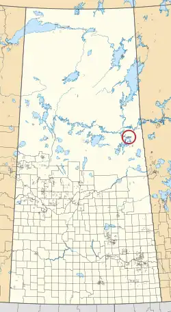 A map of the province of Saskatchewan showing 297 rural municipalities and hundreds of small Indian reserves. One is highlighted with a red circle.