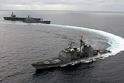 USS&nbsp;Lake Champlain conducting an emergency breakaway after refueling at sea, 2004