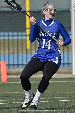 Leggings worn under a lacrosse skirt by a Washington and Lee University player
