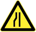 Road narrows on left