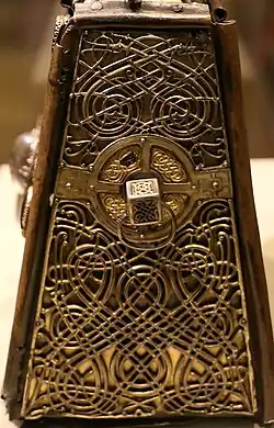 Interlace patterns on the left side of St. Patrick's Bell Shrine: the earliest, most elaborate and best preserved surviving example of the type. National Museum of Ireland (NMI).