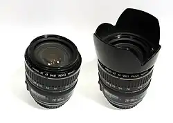 Lens without and with a conical chopped petal (or tulip) lens hood (Canon EF 28–105&nbsp;mm f/3.5–4.5 USM II).