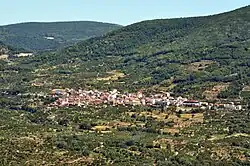 View of the town of Casas del Castañar from the neighboring town of El Torno