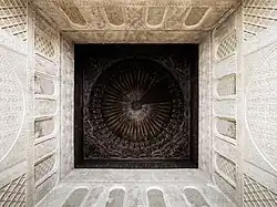 Wooden cupola ceiling over one of the lateral chambers