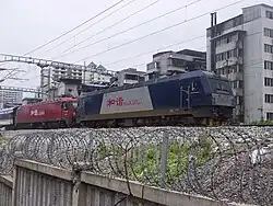 HXD3C-0927 is tracted Beijing-Nanning-Hanoi Through Train with HXD3D-0061 in Guilin.