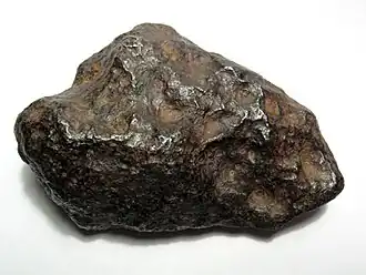 A 700-gram (25&nbsp;oz) individual Chinga iron meteorite (Ataxite, class IVB).[23] This specimen is about 9 centimeters wide.