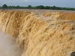 Chitrakote Falls with full muddy flow