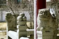 Stone lions and beasts protect the temple