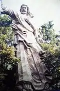 Christ's Sermon on the Mount, sculpted by Ilongot-Igorot (Isinay stock) sculptor Anselmo Day-ag, in 1978 and erected on a mountain grotto park in 1981 by the Philippine Tourism Authority through the initiative of the late Tourism Minister and Assemblyman Jose D. Aspiras and then General Manager Bernardo Vergara in Francia Sur overlooking the Marcos Highway. It was Day-ag's version of the original art deco statue of Christ the Redeemer in Brazil. The statue collapsed and fell during the July 16, 1990, earthquake and still remains buried in rubble and dirt on the mountain slope.