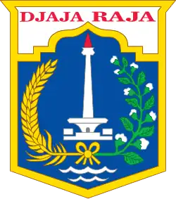 Former emblem of Special Capital Region of Jakarta (1963–1964). The motto was written in Republican Spelling System, which in current version was replaced by the Indonesian Spelling System from 1964 onwards.