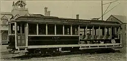 A streetcar with open and closed section
