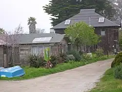 Cottages and barn from East Cliff Dr
