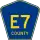 County Road E7 marker