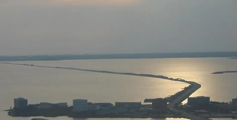 While the Courtney Campbell Causeway itself is almost 10&nbsp;mi (16.1&nbsp;km) long, its longest over-water span (center-left) is just over one half-mile (804.7m) long.