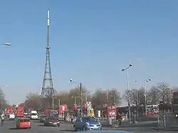 Photograph of Crystal Palace bus station, with the Crystal Palace transmitter featuring prominently in the background.