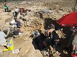 Photo of excavation fieldwork at Cueva Des-Cubierta in Pinilla del Valle, Madrid, Spain.