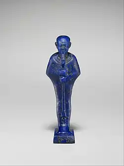 Ancient Egyptian cult image of Ptah; 945–600&nbsp;BC; lapis lazuli; height of the figure: 5.2&nbsp;cm, height of the dais: 0.4&nbsp;cm; Metropolitan Museum of Art