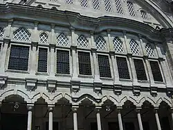 Mixtilinear arches in the lateral portico and windows of the mosque