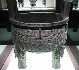 Da Ke ding; Western Zhou dynasty; height: 93.1&nbsp;cm (36.7&nbsp;in), width: 75.6&nbsp;cm (29.8&nbsp;in) (bore) & 74.9&nbsp;cm (29.5&nbsp;in) (inside diameter); discovered in 1890, at Famen Town (Fufeng County, Shaanxi); Shanghai Museum