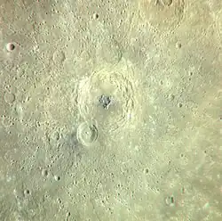 Guinness crater with prominent central peak that is a dark spot[5]