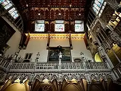 Statues and stained-glass windows inside the Central Hall