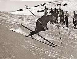 Ski instructor Olle Rimfors demonstrates the diagonal turn in Riksgränsen around the mid 1950s.