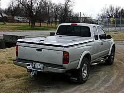 1998–2000 Tacoma rear, (small "TOYOTA" in upper left corner with smooth tail light lenses)