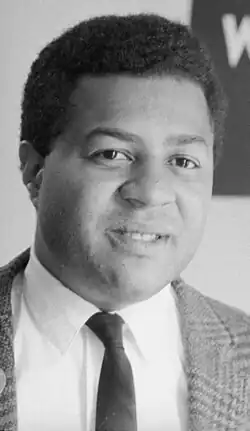 portrait photo of George Wiley in suit and tie