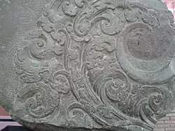 Dvaravati period stone sculpture located in Phra Pathom Chedi National Museum