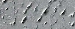 Close view of yardangs in Arabia quadrangle These features are shaped by the wind.