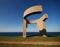 Elogio del Horizonte (Eulogy to the Horizon), concrete (1989), a&nbsp;10-meter-tall (33&nbsp;ft) contemporary monumental sculpture, by Eduardo Chillida, at Gijon, Spain