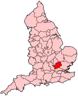 A small county slightly to the south and east of the centre of the country, and completely bounded by other counties.