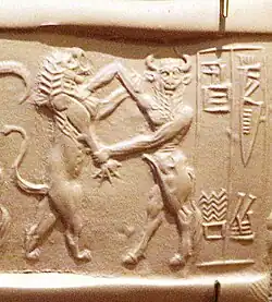 Possible depiction of Enkidu as a bull-man, fighting a lion, Akkadian Empire seal, circa 2200 BC.[25][7]