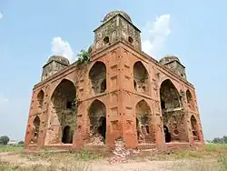 Entrance and left side view of tomb of Shagird.