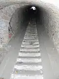 A staircase with ramps for pulling up artillery