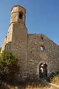 The ruined church of La Mussara, an abandoned town in the Serra de la Mussara, a subrange of the Prades Mountains